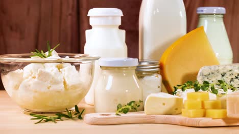 assorted dairy items displayed on wooden surface