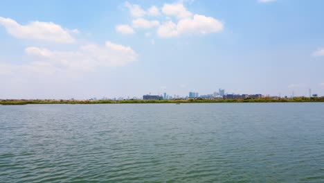 by boeung tamok’s gentle shore, phnom penh rises, proud once more