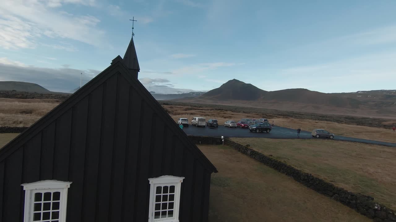 First person view of Búðakirkja, Black Church on the southern side of the Snaefellsness peninsula, Iceland