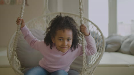 happy girl in a swing