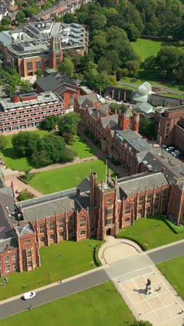 left-to-right social ratio aerial video of queen's university, belfast on a bright and sunny day. filmed in 1080x1920, 60fps and with rec709 color