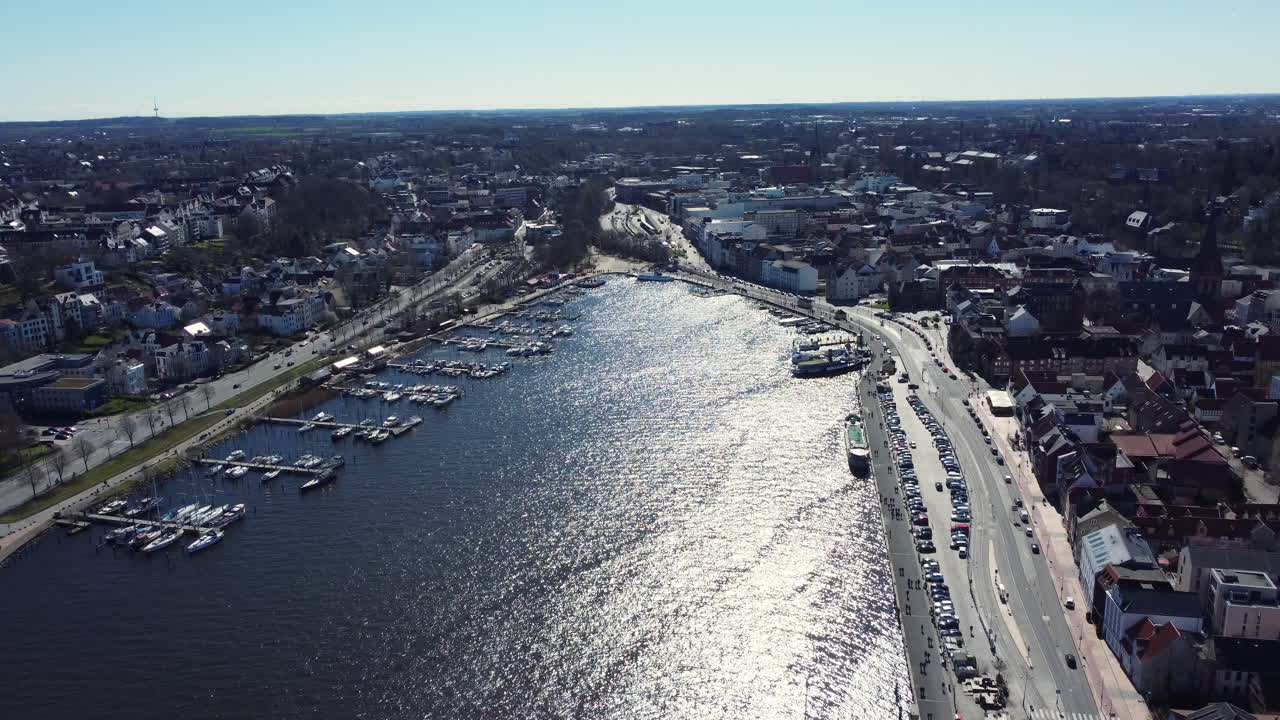 Aerial view of a European city with marina and waterfront
