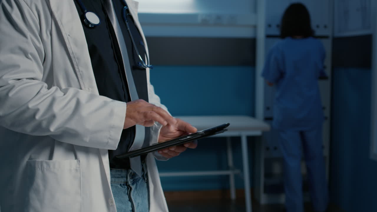 Doctor using tablet in hospital