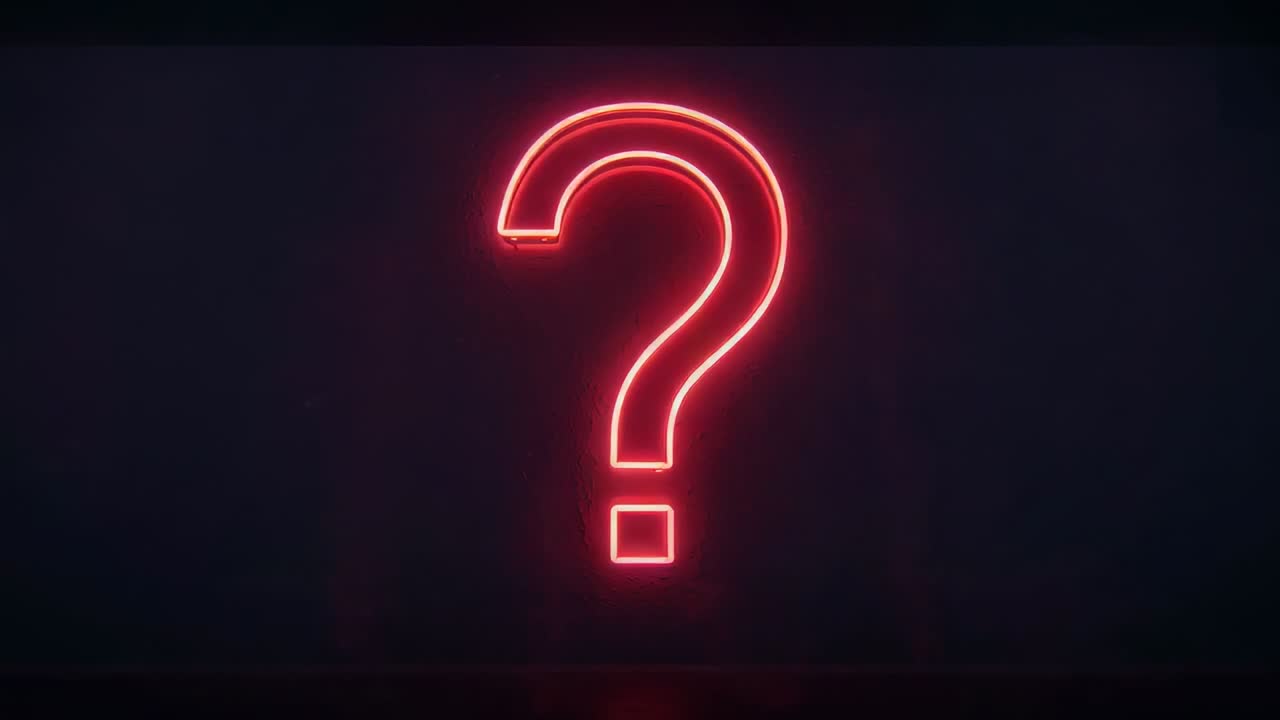 Fading into view red neon question mark sign glowing on dark studio wall, for emphasis
