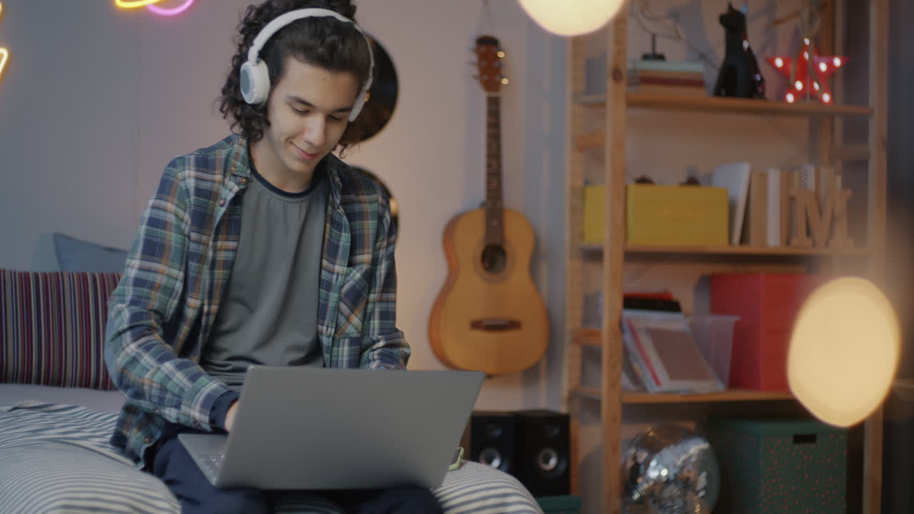 Teenager studying in a cozy bedroom