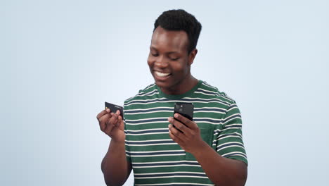 Man,-credit-card-and-smartphone-in-studio