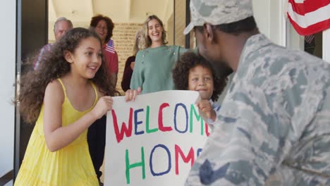 video of happy diverse family welcoming soldier father