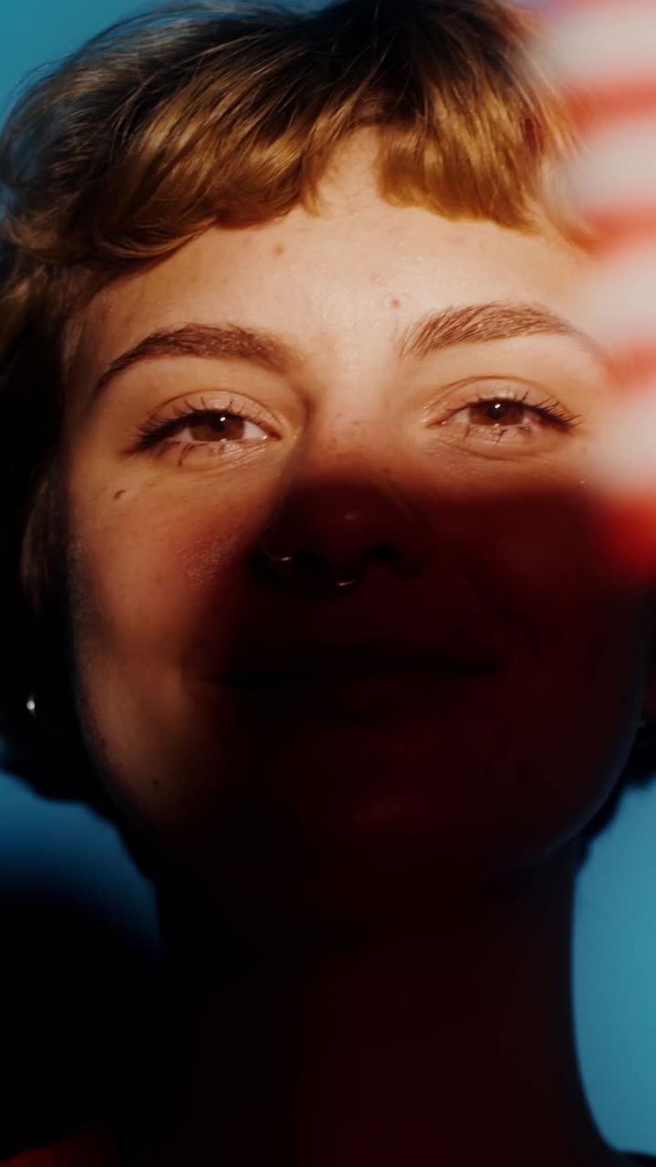 Close-up portrait of a smiling young woman