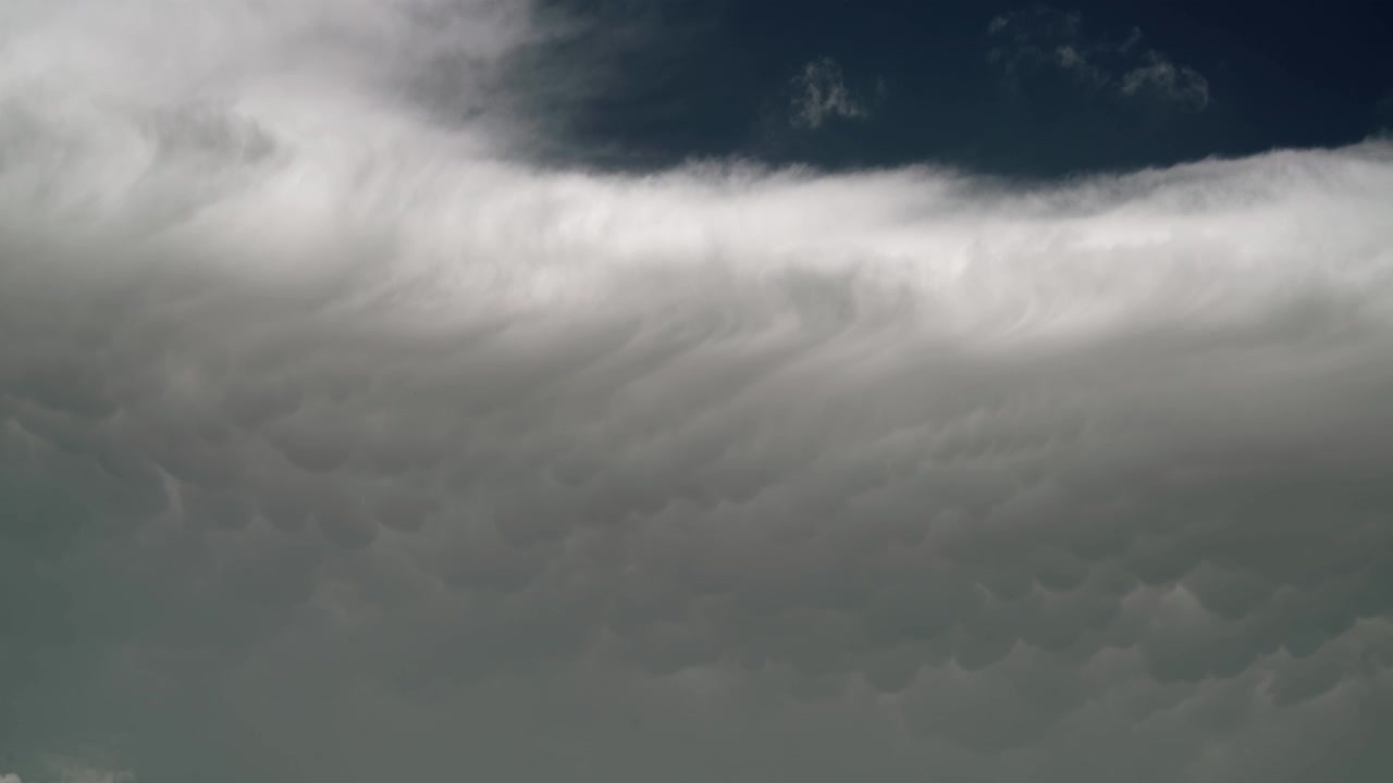 Dramatic Mammatus Clouds Forming in Stormy Sky