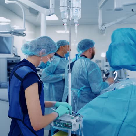 surgical team performing surgery in modern operation theater. working with surgical instruments.