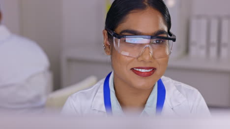 scientist in laboratory, woman with smile