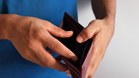 man holding an empty wallet