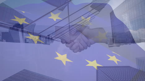 animation of european union flag over businessman and businesswoman shaking hands