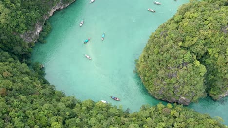 drone footage of hong island lagoon with boats navigating trough-10