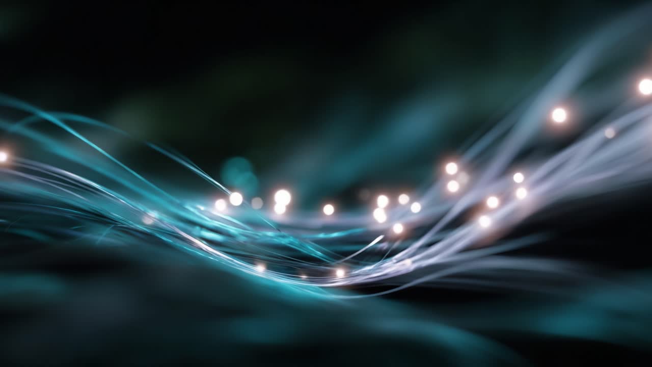 Un’ipnotica esposizione di onde di luce colorate e particelle eteree che creano un movimento fluido e onirico in uno sfondo scuro e suggestivo