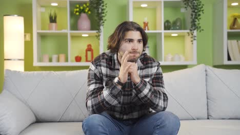 Young-man-with-schizophrenia-has-a-nervous-breakdown-at-home.