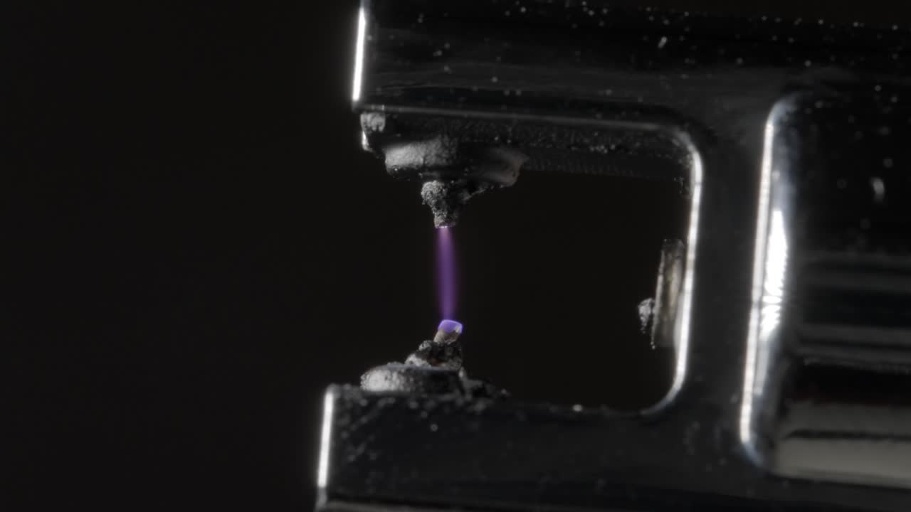 Close-Up of Electric Arc Lighter – High-Speed Footage