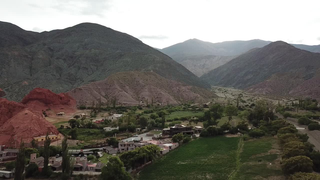 Purmamarca City, Jujuy Argentina. Aerial View of Picturesque Green Valley and Colorful Hills in Twilight