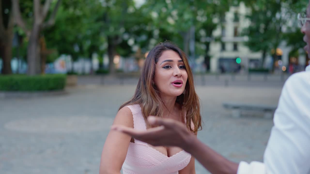 A couple having a heated argument in a park