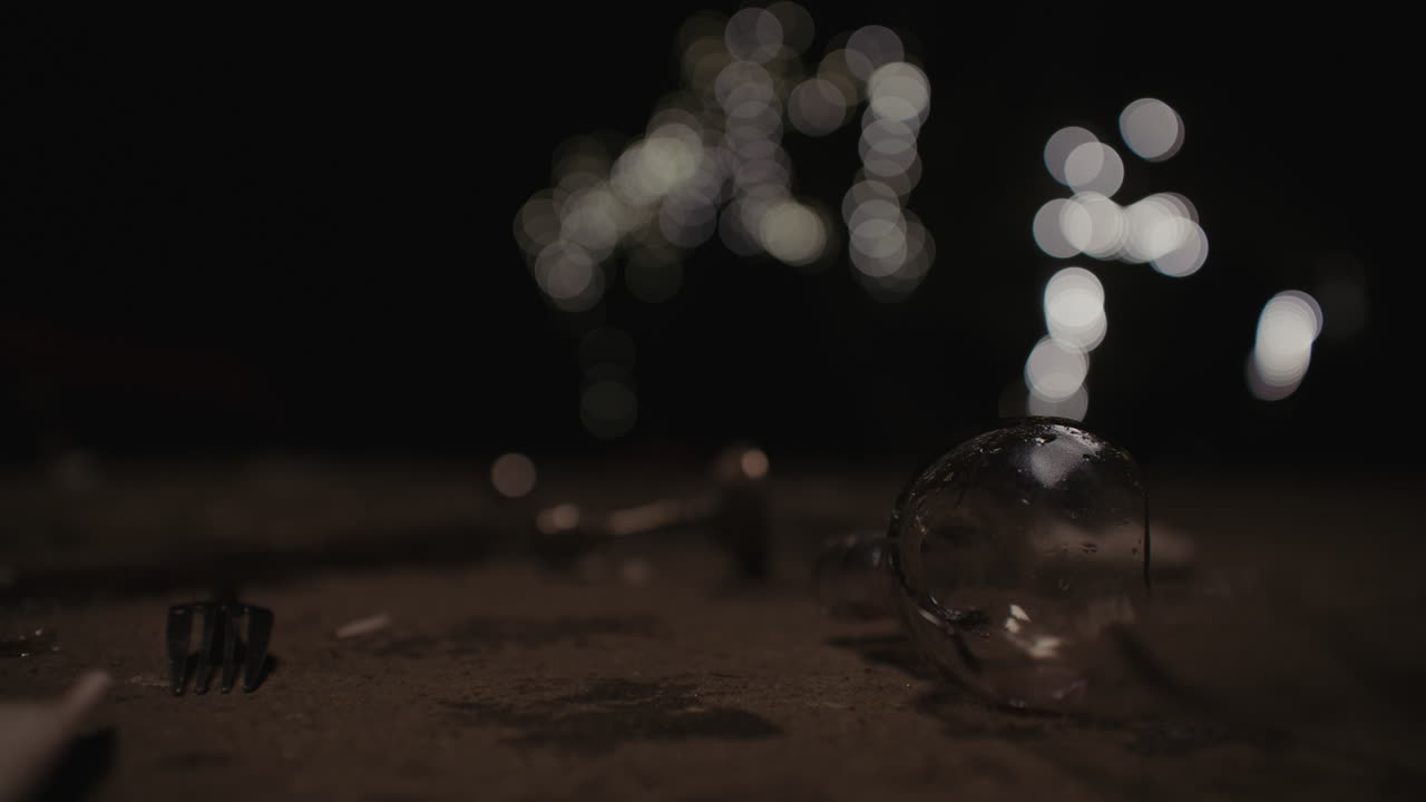 Broken party remnants at night