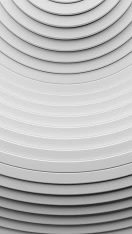 stack of white plates stacked on top of each other. vertical looped animation