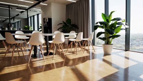 modern empty office meeting area with large windows and plant