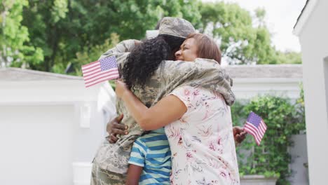 Video-of-african-american-family-welcoming-soldier-mother-after-returning-home