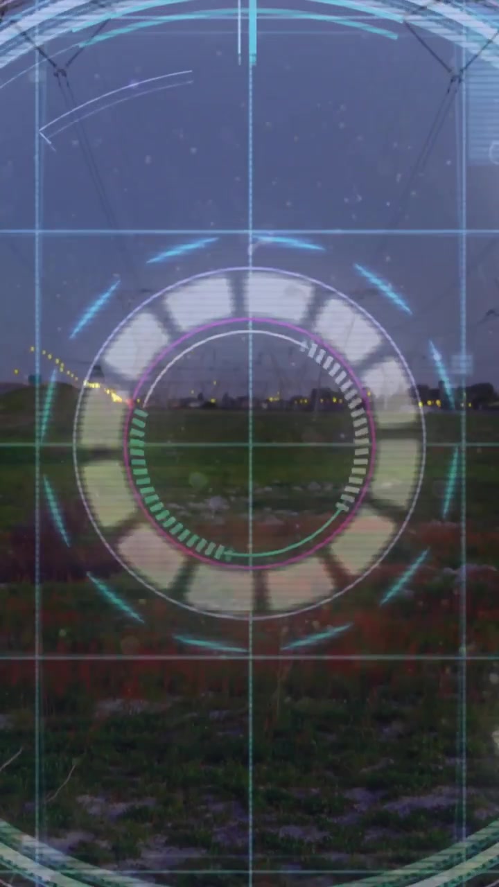 Video verticale: Sovrapposizione crepuscolare che avvia il bagliore dell'HUD, anelli che si illuminano, arco che si muove per scansionare le torri.