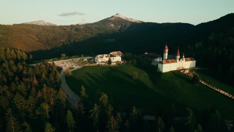 alpine monastery at sunrise/sunset