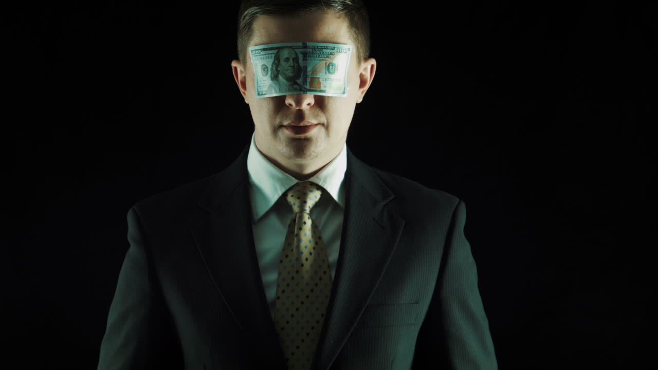 The Person In a Suit Closes Eyes By The Dollars