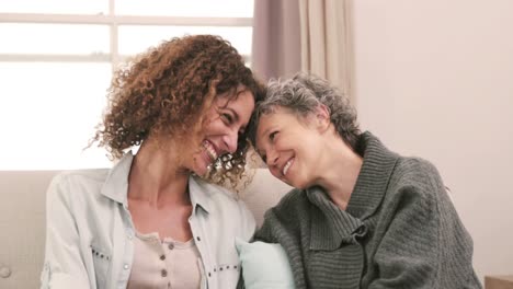 smiling women with head to head