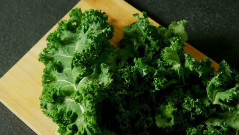 green leafy vegetable on a chopping board 4k