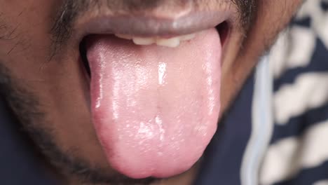 close-up of a person's tongue and mouth