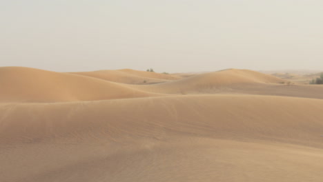 Wind-Blowing-Over-Sand-Dune-In-The-Desert-1