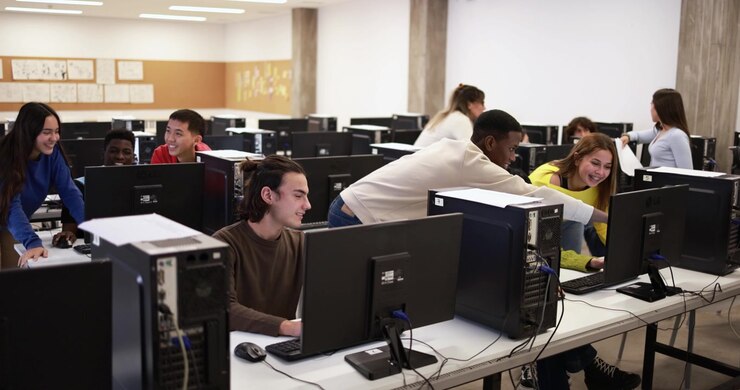 Diverse Group of Students Collaborating in a University Computer Lab