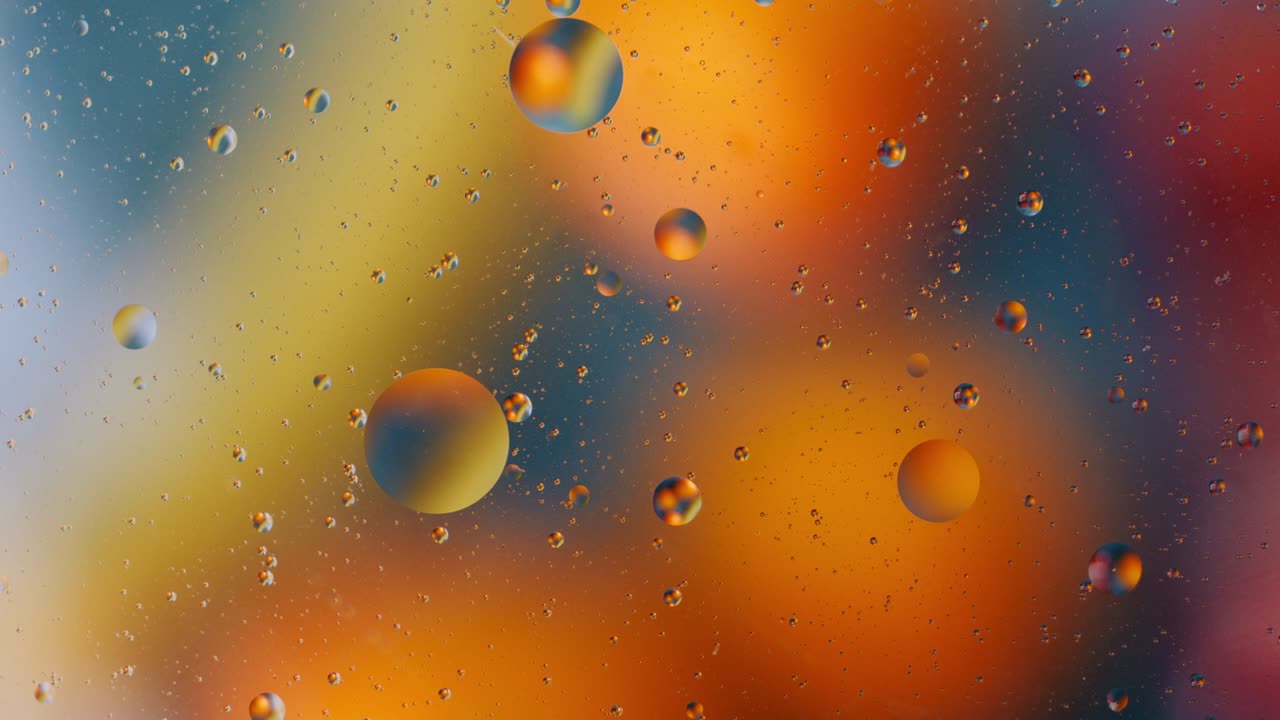 Oil bubbles on colorful background, colorful abstraction 4k