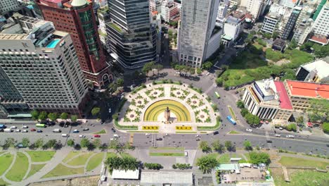 static-aerial-top-down-view-of-cars-and-motorbikes-driving-in-a-roundabout-in-Saigon-Vietnam-on-a-sunny-day