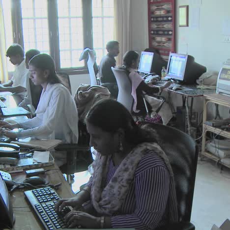 A-group-of-people-are-busy-using-computers