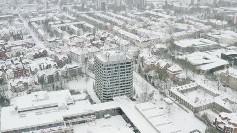 drone aerial views of the student town göttingen during winter 2021 in heavy snowfall
