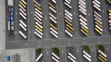 aerial view of a shipping container terminal and truck parking area