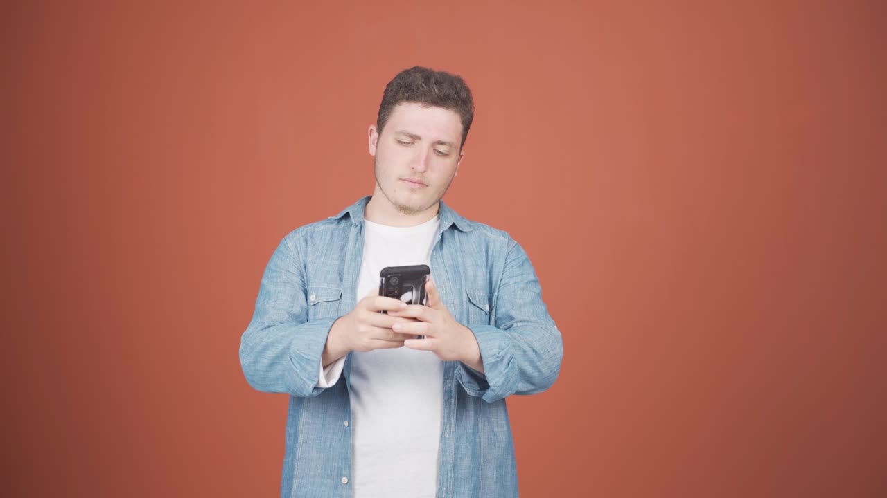 The man who can't use the app on the phone.