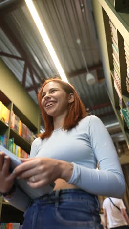 woman using a tablet in a library