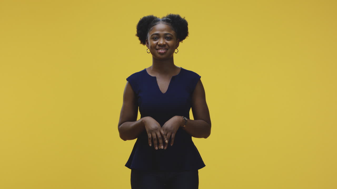 A young black woman expresses various emotions and playful gestures on a yellow background