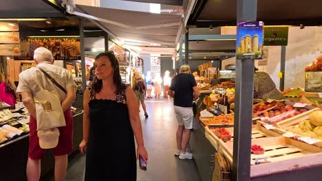 people shopping at a vibrant indoor market