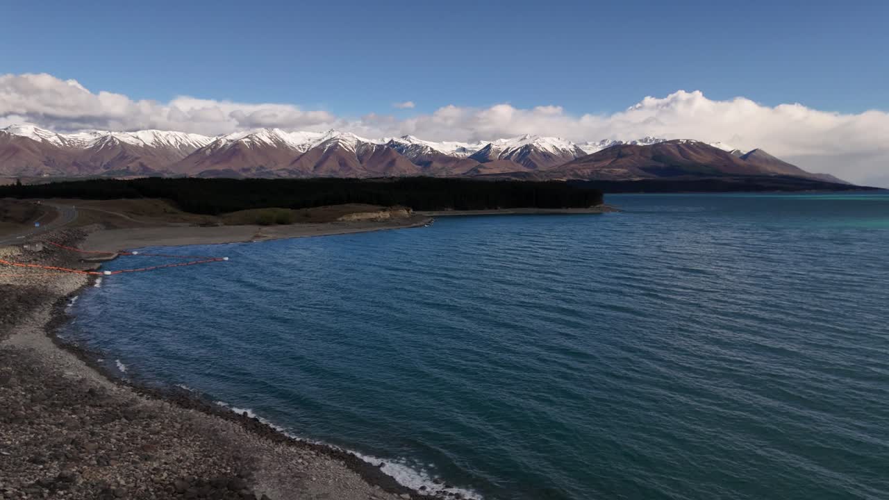 Lake Pukaiki and the snow capped peaks of New Zealand's Southern Alps in the background