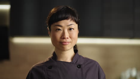 portrait of an asian woman chef