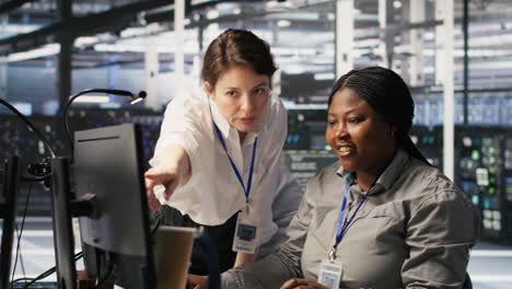 vertical video data center team leader and it expert reviewing performance dashboards of ai