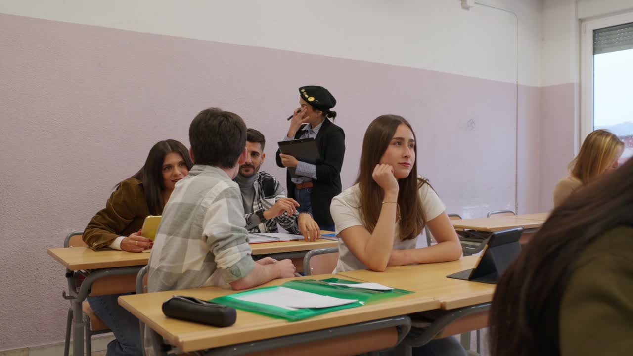 Students attending class in a classroom setting