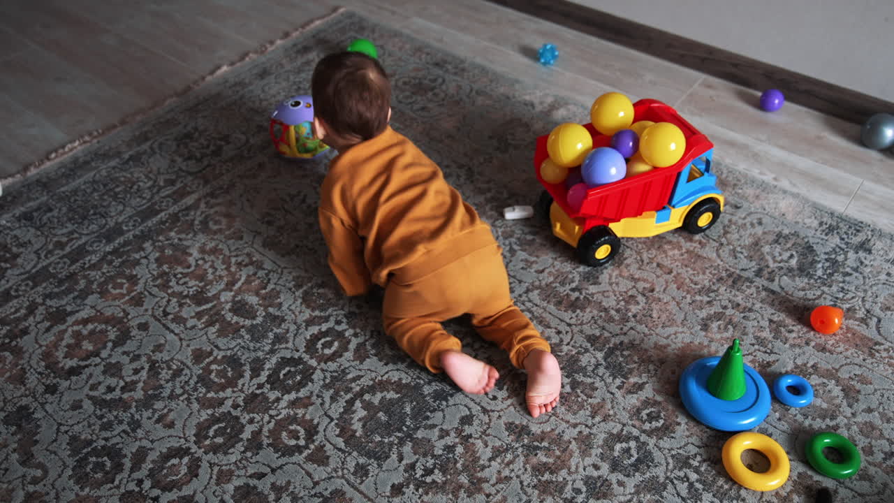 Baby Crawling and Playing with Toys