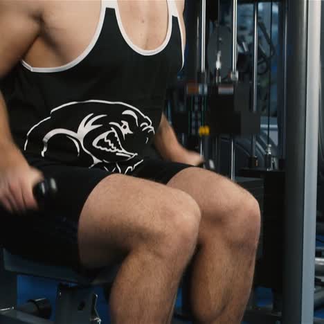 a young man trains in a gym 9